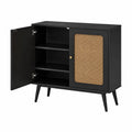 Credenza nera in legno con porta in rattan